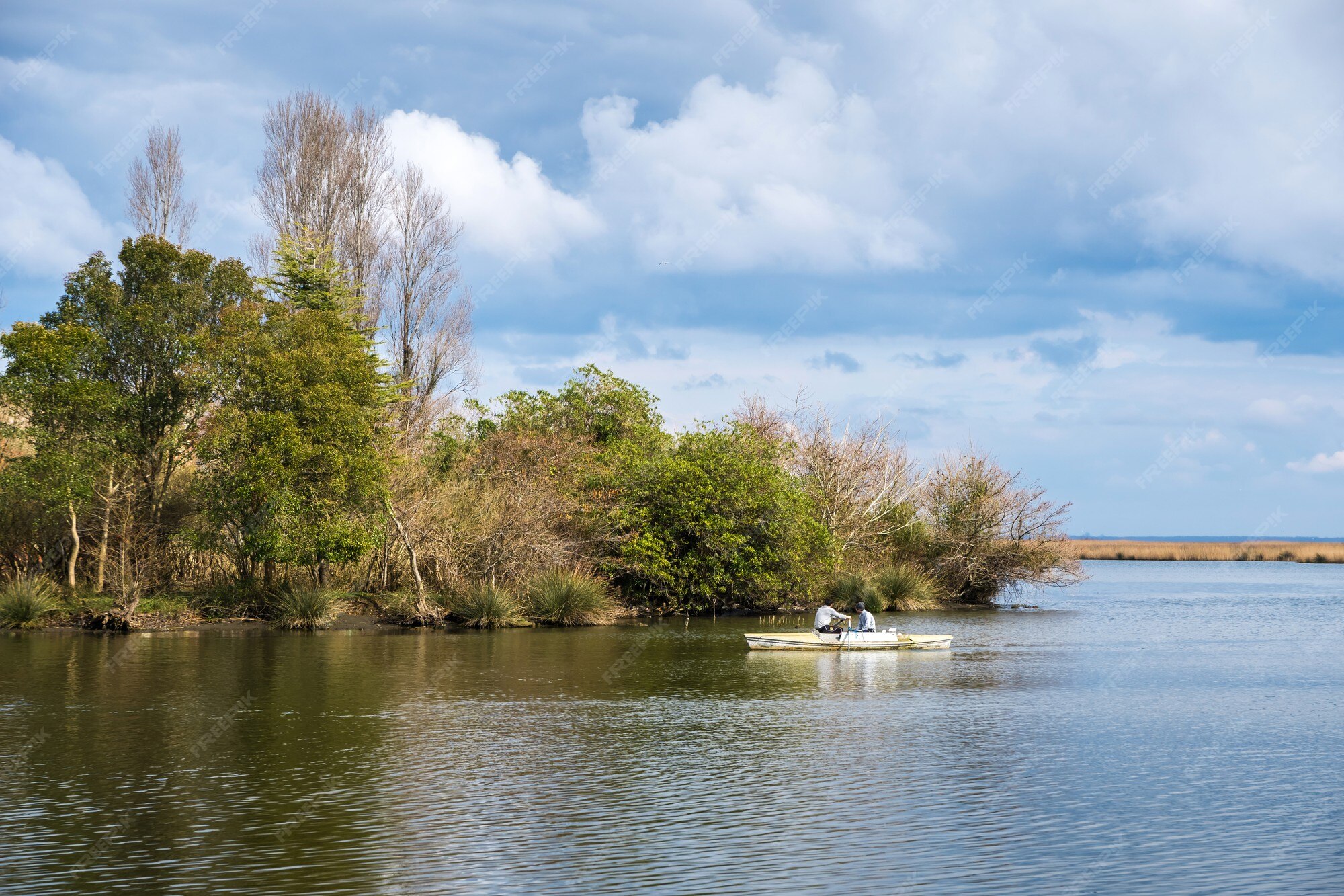 Community volunteers participating in river cleanup activities along Kaparchina River